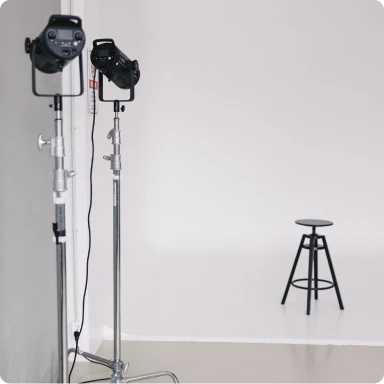Stool and camera lights in a photoshoot setup