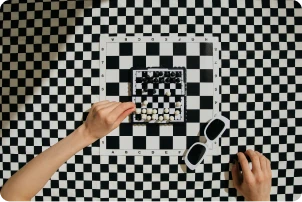 Chess board on checkered background.